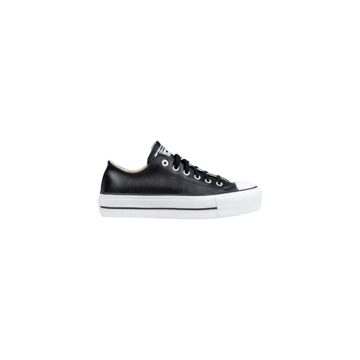 Converse Baskets à plateforme pour femmes en cuir noir, avec tige en cuir noir et semelle et bout renforcés en caoutchouc blanc.