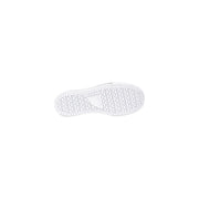 Back side of converse women black platform fabric sneakers showing white rubber sole with textured zigzag pattern and label