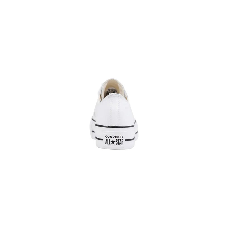 Converse women leather platform sneaker in white with black rubber sole and classic stitching in low-top design
