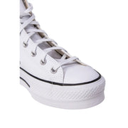 Converse women white polyurethane platform sneaker with white leather upper black rubber sole and classic branding