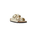 Cream-colored double-strap sandal with gold buckles from Cream Two Strap Sandal collection