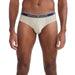 Cream-colored men’s briefs with Emporio Armani waistband worn by a model