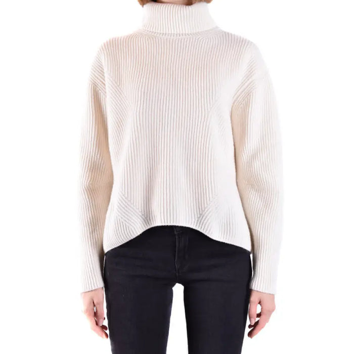 Cream-colored ribbed turtleneck sweater displayed in the product listing