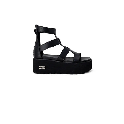 Sandales compensées en cuir noir pour femmes, à enfiler, avec plusieurs brides et une fermeture éclair à l'arrière.