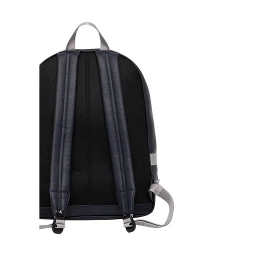 Dark leather backpack with gray straps and silver accents for stylish storage