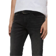 Dark wash jeans by Calvin Klein slim fit black denim with subtle fading and classic five-pocket design