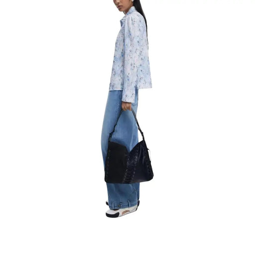 Black textured shoulder bag from Desigual with polyurethane finish and zip closure