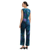 Desigual blue sleeveless v neck jumpsuit for women with wide-leg and vibrant purple floral print and fitted waistband