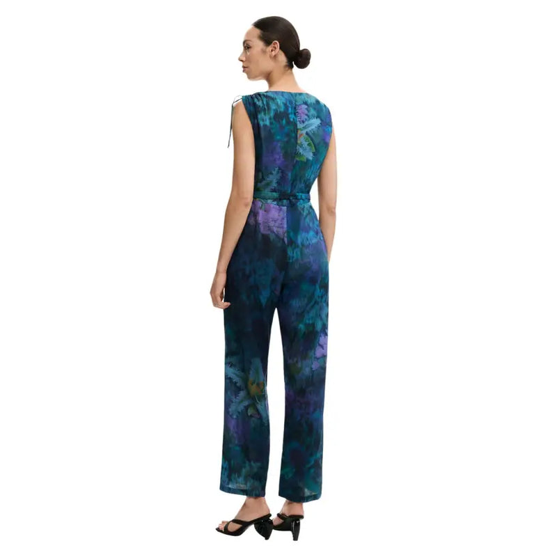 Desigual blue sleeveless v neck jumpsuit for women with wide-leg and vibrant purple floral print and fitted waistband