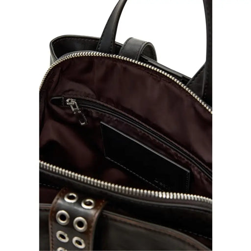 Sac cabas en cuir noir avec fermetures éclair argentées et sangles cloutées, style sac à dos Desigual