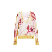 A soft long-sleeved v-neck knitwear for women by Desigual in pale yellow with vibrant pink floral patterns