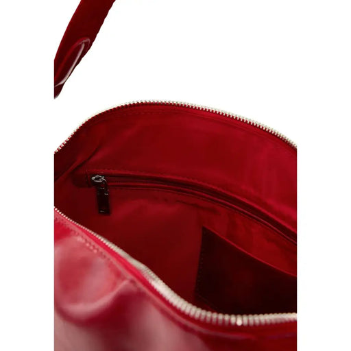 Desigual red polyester handbag with zip pockets featuring red patent leather, silver zipper, and black metal pull tab