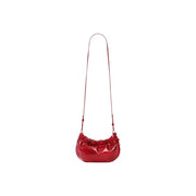 Desigual red polyester shoulder bag for women featuring a glossy leather crossbody design with ruched top and slender strap