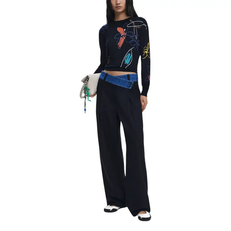 Women’s long-sleeve black floral knit sweater with colorful abstract patterns