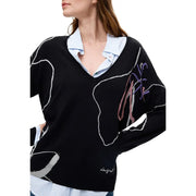 Pull Desigual pour femme en maille viscose noire à col V orné de broderies abstraites blanches, roses et violettes.