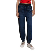 Jean Desigual pour femme en denim de coton bleu foncé stretch, pantalon de jogging bleu foncé avec empiècements latéraux noirs et taille élastiquée à cordon.