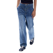 Jean Desigual pour femme en denim stretch bleu coton, taille haute, coupe large et surpiqûres apparentes.
