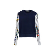 Pull Desigual bleu marine à manches longues en maille, orné de rayures et de motifs floraux.