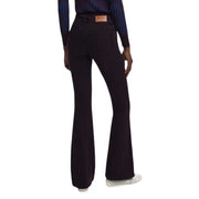 Jean évasé Desigual Bordeaux, vue de dos, en denim indigo foncé avec empiècement en cuir