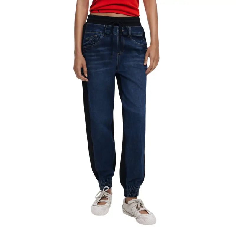 Women’s dark wash denim jogger jeans with black elastic waistband and side stripes