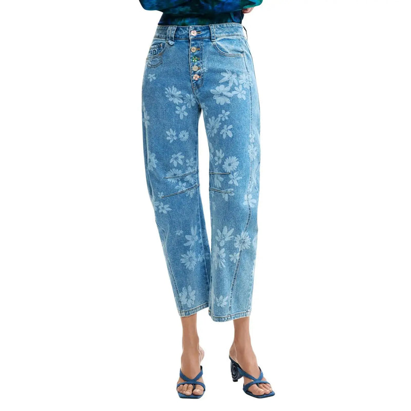 Jean en denim de coton bleu clair Desigual pour femme, orné d'un motif floral blanc et d'une braguette boutonnée.