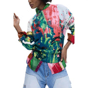 Pull long vert en maille Desigual pour femme, orné d'un motif abstrait vibrant d'éclaboussures de peinture, en tissu acrylique mélangé.