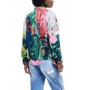 Pull long Desigual pour femme, en maille verte acrylique, orné d'un motif abstrait vibrant d'éclaboussures de peinture aux couleurs vives.