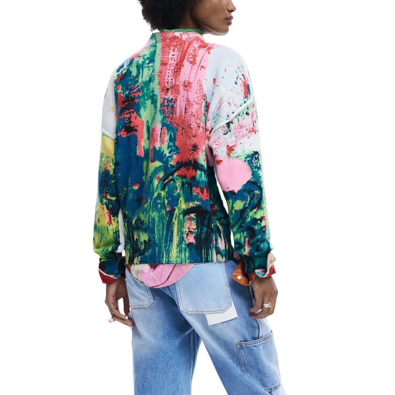 Pull long Desigual pour femme, en maille verte acrylique, orné d'un motif abstrait vibrant d'éclaboussures de peinture aux couleurs vives.