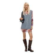 Black studded crossbody bag paired with desigual women grey polyester sleeveless low cut dress front view
