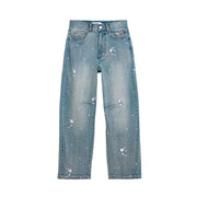 Jean Desigual pour femme en coton stretch bleu clair, orné d'un motif d'étoiles délavé et de subtiles décorations blanches.