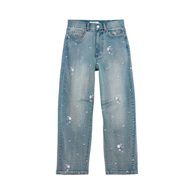 Jean Desigual pour femme en coton stretch bleu clair, orné d'un motif d'étoiles délavé et de subtiles décorations blanches.