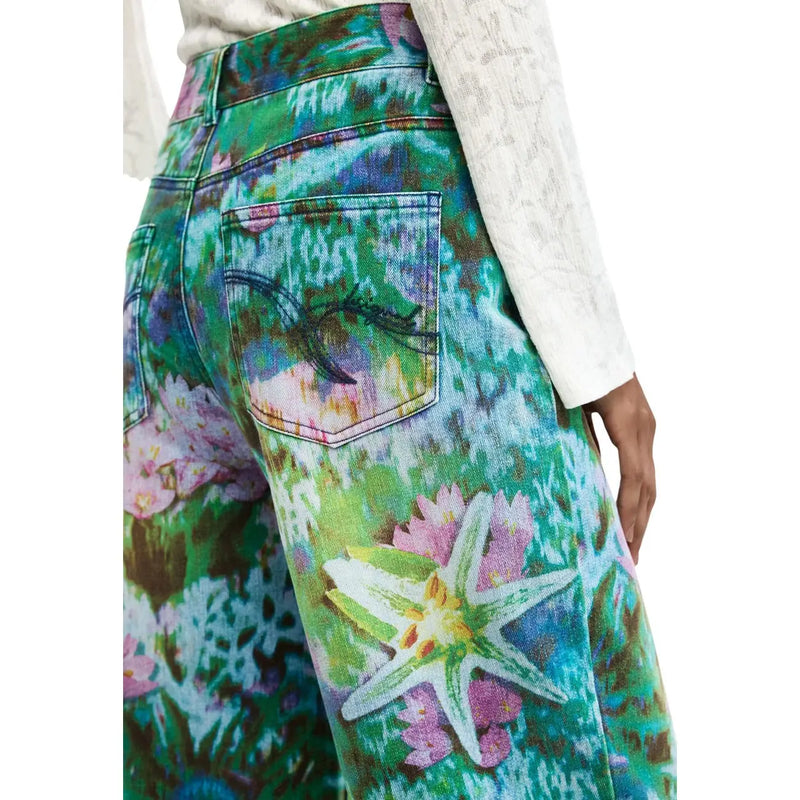 Jean Desigual pour femme en coton bleu clair à fleurs, imprimé étoiles de mer vert turquoise, rose et violet, coupe large.