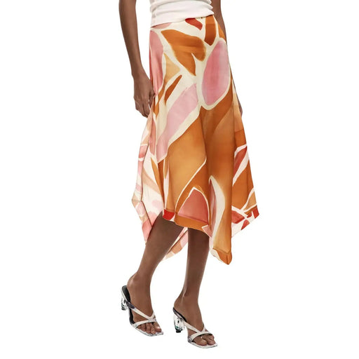 Jupe Desigual pour femme en viscose orange, à la coupe asymétrique fluide, dans des tons orange, rose et crème éclatants.