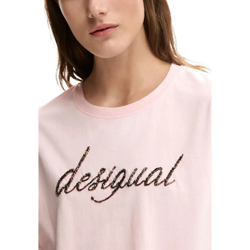 A soft pink Desigual women cotton t-shirt with long sleeves and sparkling black sequin cursive logo on the front