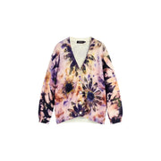 Pull Desigual pour femme en maille de coton rose à fleurs, composé d'un cardigan doux aux tons pastel orné de fleurs violettes et orange éclatantes.