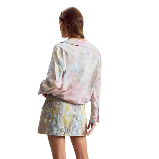 Pastel tie-dye denim skirt with abstract pattern in soft pinks and blues paired with Desigual women pink floral cotton shirt