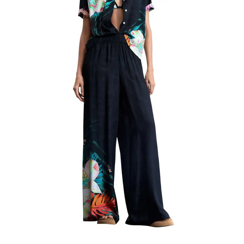 Pantalon noir à jambes larges en viscose de Desigual orné d'un imprimé floral tropical éclatant sur le côté