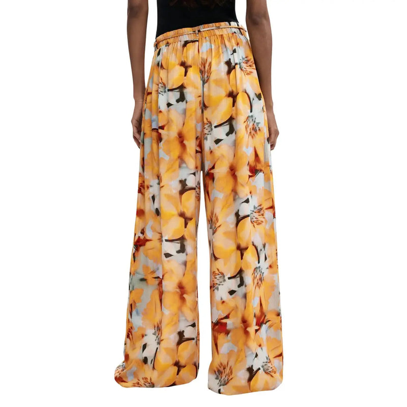 Pantalon Desigual pour femme, coupe large, en viscose orange à motif floral jaune, blanc et noir éclatant.