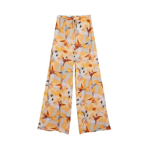 Pantalon Desigual pour femme, en viscose orange à motif floral, coupe large, taille élastiquée et cordon de serrage, avec des accents jaune vif et gris.