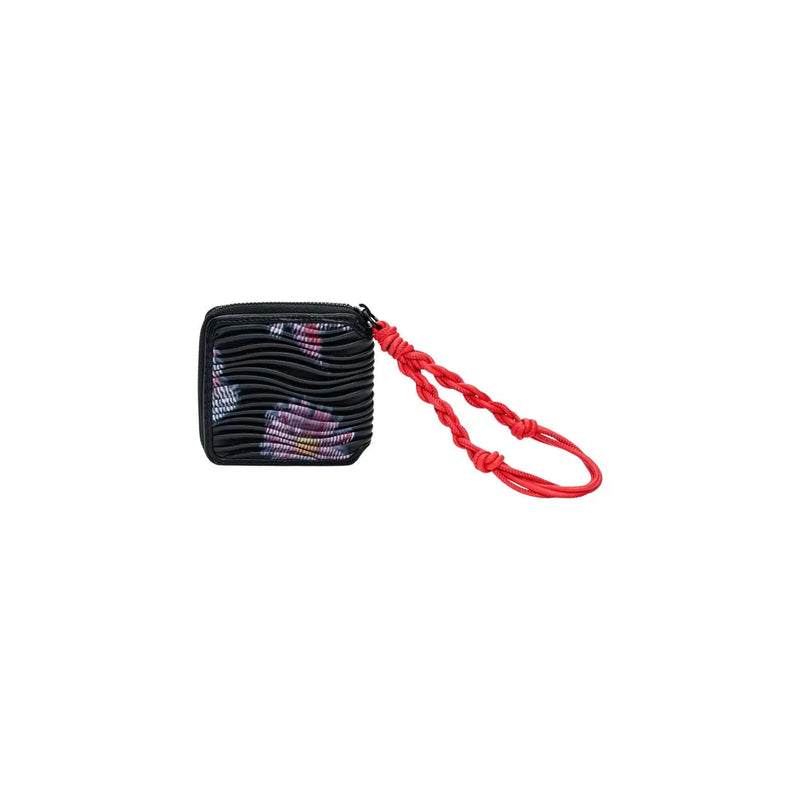 Portefeuille Desigual pour femme, noir, zippé, en polyester texturé, avec dragonne tressée rouge vif et motifs abstraits multicolores.
