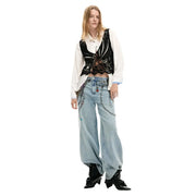 Black lace butterfly-shaped corset vest with intricate crochet detailing worn over desigual women white cotton classic button shirt
