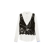 Black lace vest with intricate floral patterns worn over desigual women white cotton classic button shirt