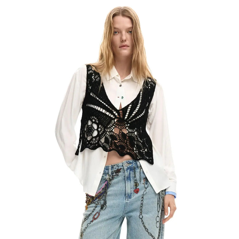 Black lace crochet vest with intricate floral patterns worn over Desigual women white cotton classic button shirt