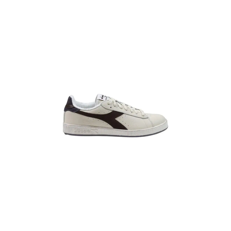 couleur crème Diadora Baskets pour homme en daim et cuir avec bande diagonale noire, lacets blancs et semelle en caoutchouc texturée