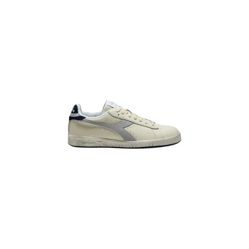 couleur crème Diadora Baskets pour homme en daim beige, tige basse, bande grise et languette arrière bleu marine