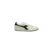 Cuir couleur crème diadora Baskets homme en daim beige avec une bande diagonale vert foncé et un empiècement talon bleu marine.