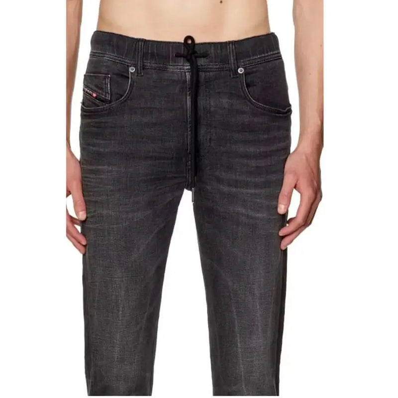 Charcoal grey distressed jeans with drawstring waistband and pockets.