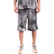 Black and white tie-dye cotton shorts with distressed edges.
