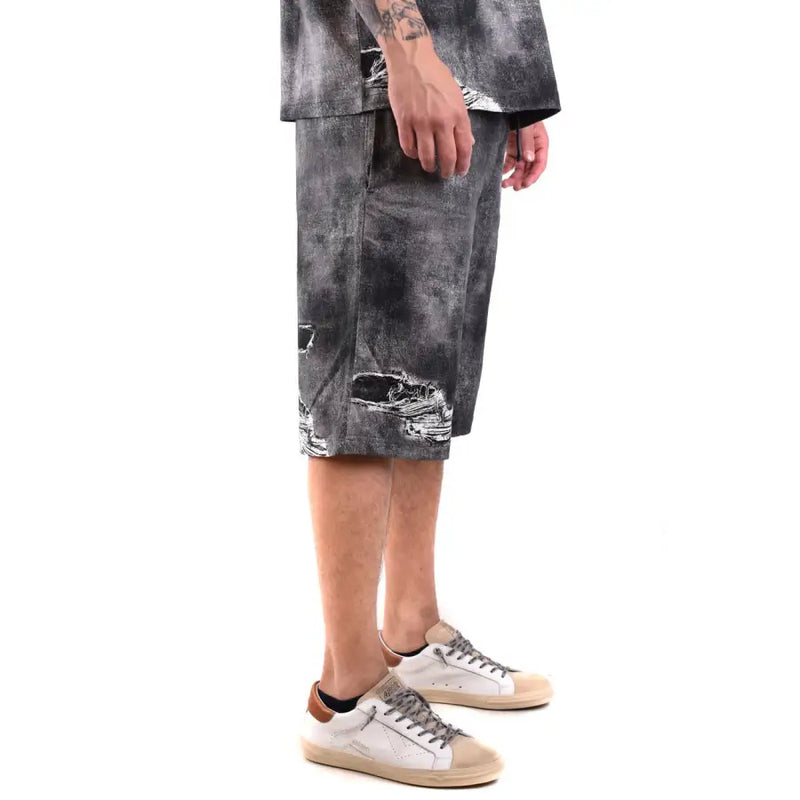Black distressed cargo shorts with multiple pockets and a faded wash design.