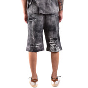 Diesel Short en coton pour homme, noir et blanc, en tissu usé et déchiré (vue de face)